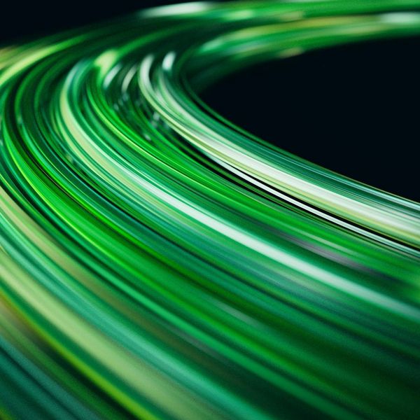 Swirling energy lines in mint green on dark background